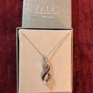 Sterling silver and diamond necklace and pendant